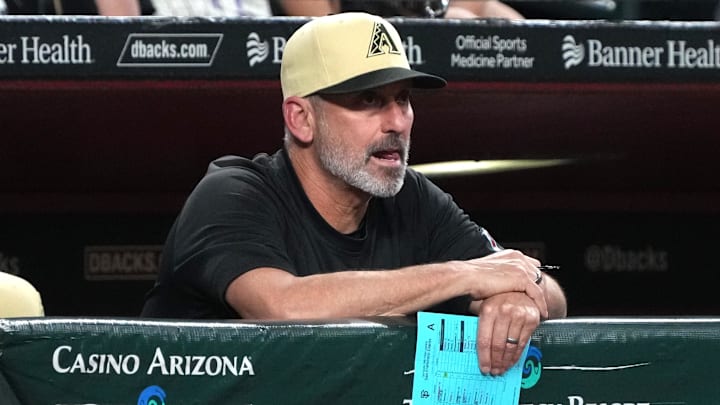 Sep 24, 2024; Phoenix, Arizona, USA; Arizona Diamondbacks manager Torey Lovullo (17) watches against the San Francisco Giants in the eighth inning at Chase Field. Mandatory Credit: Rick Scuteri-Imagn Images Sep 24, 2024; Phoenix, Arizona, USA; Arizona Diamondbacks manager Torey Lovullo (17) watches against the San Francisco Giants in the eighth inning at Chase Field. Mandatory Credit: Rick Scuteri-Imagn Images