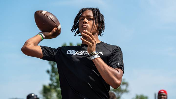 Donald Tabron II, 16, a quarterback at Cass Technical High School, throws a football during a private workout in Detroit on Saturday, June 21, 2025. Donald Tabron II, 16, a quarterback at Cass Technical High School, throws a football during a private workout in Detroit on Saturday, June 21, 2025.