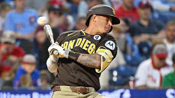 Jun 2, 2026; Philadelphia, Pennsylvania, USA; San Diego Padres third baseman Manny MacHado (13) avoids being hit by a pitch during the sixth inning against the Philadelphia Phillies  at Citizens Bank Park. Mandatory Credit: Eric Hartline-Imagn Images
