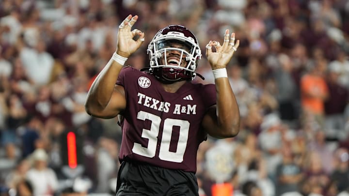 Aug 30, 2025; College Station, Texas, USA; Texas A&M Aggies defensive end Solomon Williams (30) celebrates during the second half against the UTSA Roadrunners at Kyle Field. Mandatory Credit: Sean Thomas-Imagn Images