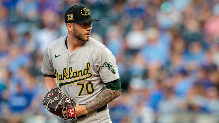 May 18, 2024; Kansas City, Missouri, USA; Oakland Athletics pitcher Lucas Erceg (70) throws during the seventh inning against the Kansas City Royals at Kauffman Stadium. May 18, 2024; Kansas City, Missouri, USA; Oakland Athletics pitcher Lucas Erceg (70) throws during the seventh inning against the Kansas City Royals at Kauffman Stadium.