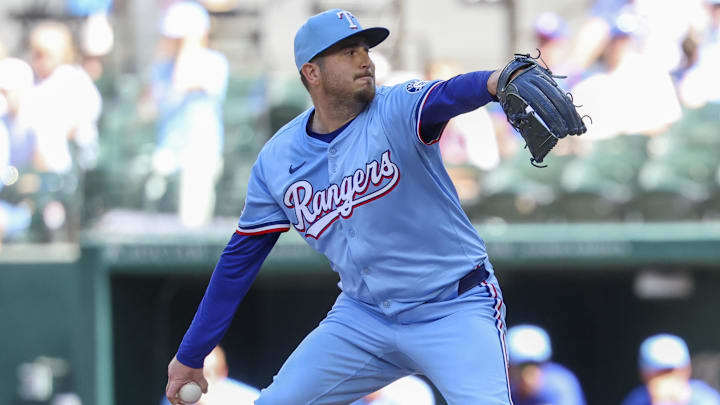 May 4, 2025; Arlington, Texas, USA;  Texas Rangers relief pitcher Luke Jackson (77) throws during the ninth inning against the Seattle Mariners at Globe Life Field.