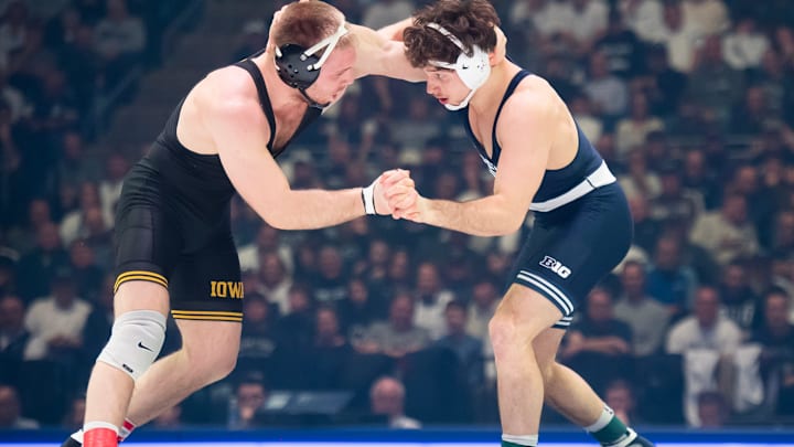 Penn State’s Levi Haines, right, wrestles Iowa's Patrick Kennedy in the 174-pound bout of the Nittany Lions vs. Hawkeyes dual match in January. Penn State’s Levi Haines, right, wrestles Iowa's Patrick Kennedy in the 174-pound bout of the Nittany Lions vs. Hawkeyes dual match in January.