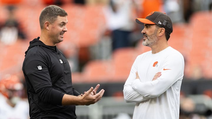 Sep 10, 2023; Cleveland, Ohio, USA; Cincinnati Bengals head coach Zac Taylor and Cleveland Browns head coach Kevin Stefanski talk during warmups before the game at Cleveland Browns Stadium. Mandatory Credit: Scott Galvin-Imagn Images