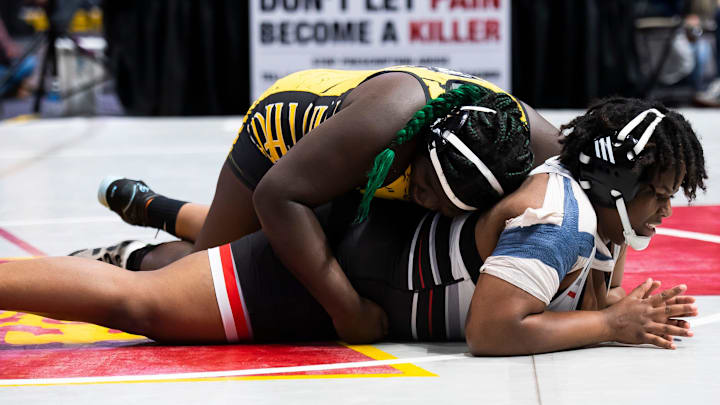 Panther Valley's Brenda Banks (top) scores a takedown on South Western's Kayla Henderson during a 235-pound semifinal bout at the PIAA Girls' Wrestling Championships at the Giant Center on March 8, 2024, in Hershey.