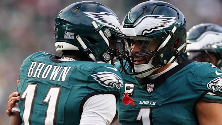 Jan 26, 2025; Philadelphia, PA, USA; Philadelphia Eagles quarterback Jalen Hurts (1) and wide receiver A.J. Brown (11) celebrate after a touchdown against the Washington Commanders during the first half in the NFC Championship game at Lincoln Financial Field. Mandatory Credit: Bill Streicher-Imagn Images