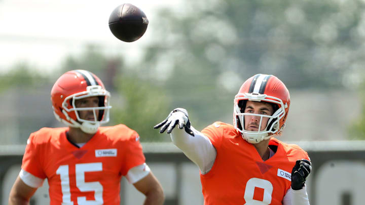 Cleveland Browns quarterback Kenny Pickett (8) throws as quarterback Joe Flacco (15) looks on during NFL training camp at CrossCountry Mortgage Campus, Friday, Aug. 1, 2025, in Berea, Ohio.