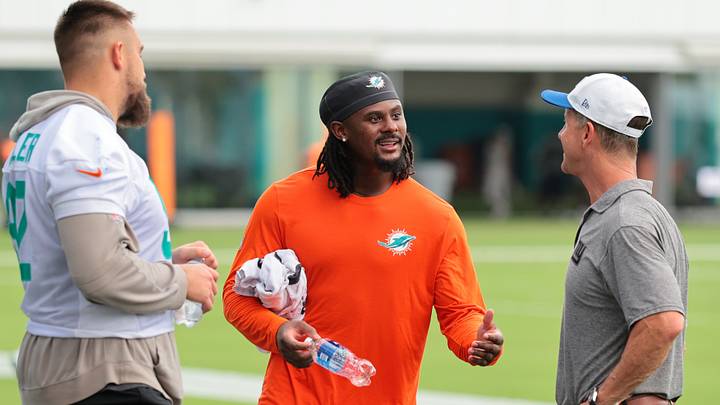 Miami Dolphins quarterback Malik Willis (2) speaks to New York Giants head coach John Harbaugh and Miami Dolphins defensive tackle Zach Sieler (92) after a joint practice at the Baptist Health Training Complex. Miami Dolphins quarterback Malik Willis (2) speaks to New York Giants head coach John Harbaugh and Miami Dolphins defensive tackle Zach Sieler (92) after a joint practice at the Baptist Health Training Complex.