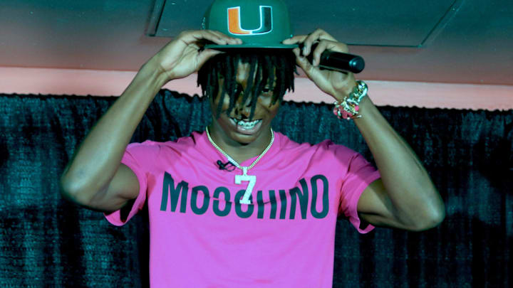 Lakeland's Cormani McClain puts on the baseball cap after choosing Miami.

Syndication Lakeland