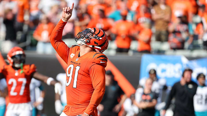 Sep 14, 2025; Cincinnati, Ohio, USA;  Cincinnati Bengals defensive end Trey Hendrickson (91) celebrates his sack during the fourth quarter against the Jacksonville Jaguars at Paycor Stadium. Mandatory Credit: Joseph Maiorana-Imagn Images