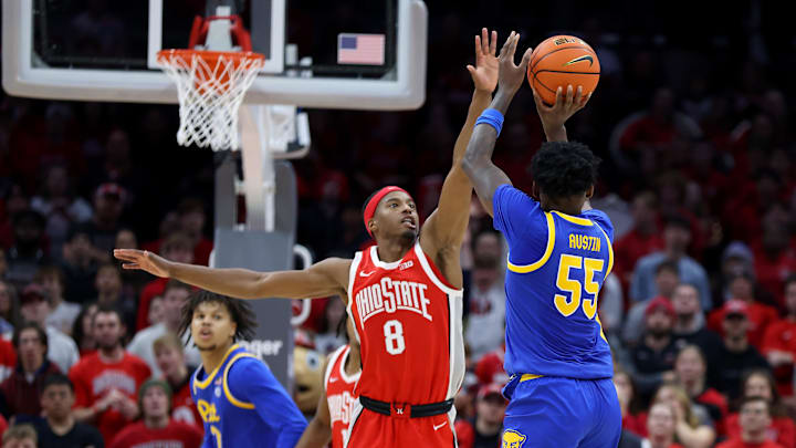 Nov 29, 2024; Columbus, Ohio, USA;  Pittsburgh Panthers forward Zack Austin (55) takes thew winning three point shot over Ohio State Buckeyes guard Micah Parrish (8) to win in overtime at the buzzer at Value City Arena. Mandatory Credit: Joseph Maiorana-Imagn Images