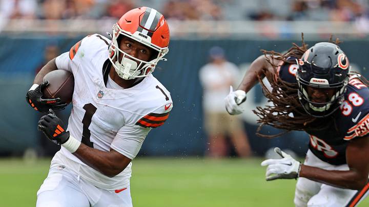 Aug 15, 2026; Chicago, Illinois, USA; Cleveland Browns wide receiver Kc Concepcion (1) makes a catch past Chicago Bears safety Skyler Thomas (38) during the first half at Soldier Field. Mandatory Credit: Mike Dinovo-Imagn Images