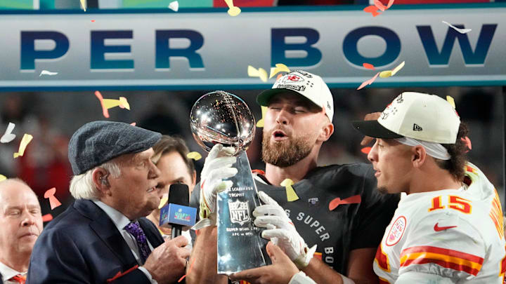 Super Bowl 57: Kansas City Chiefs quarterback Patrick Mahomes passes the the Lombardi Trophy to Travis Kelce after winning the Super Bowl against the Philadelphia Eagles at State Farm Stadium on Feb 12, 2023.