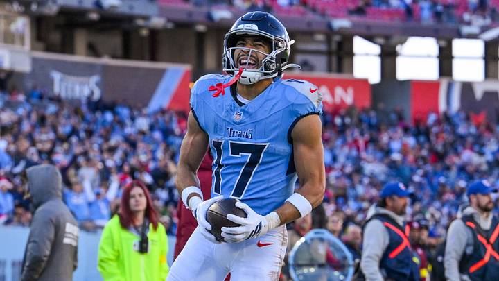 Dec 21, 2025; Nashville, Tennessee, USA;  Tennessee Titans wide receiver Chimere Dike (17) celebrates his touchdown against the Kansas City Chiefs during the second half at Nissan Stadium. Mandatory Credit: Steve Roberts-Imagn Images