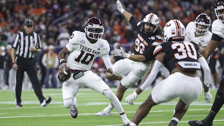 Dec 27, 2023; Houston, TX, USA; Texas A&M Aggies quarterback Marcel Reed (10) scrambles with the