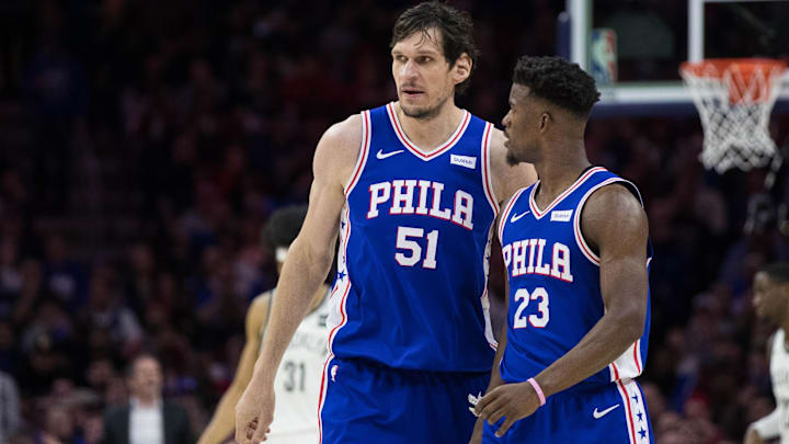 Apr 15, 2019; Philadelphia, PA, USA; Philadelphia 76ers center Boban Marjanovic (51) and guard Jimmy Butler (23) talk during the second quarter in game two of the first round of the 2019 NBA Playoffs against the Brooklyn Nets at Wells Fargo Center. Mandatory Credit: Bill Streicher-Imagn Images Apr 15, 2019; Philadelphia, PA, USA; Philadelphia 76ers center Boban Marjanovic (51) and guard Jimmy Butler (23) talk during the second quarter in game two of the first round of the 2019 NBA Playoffs against the Brooklyn Nets at Wells Fargo Center. Mandatory Credit: Bill Streicher-Imagn Images