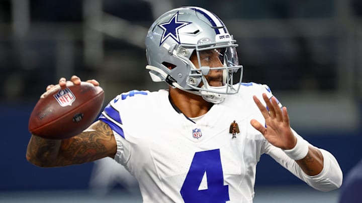 Aug 16, 2025; Arlington, Texas, USA;  Dallas Cowboys quarterback Dak Prescott (4) warms up before the game against the Baltimore Ravens at AT&T Stadium.