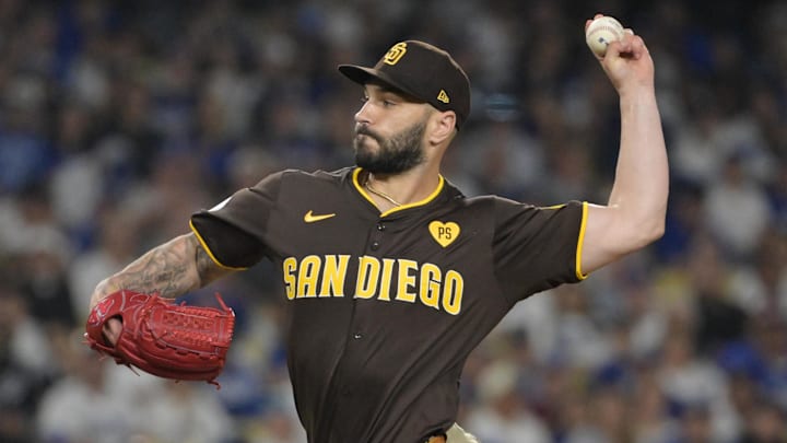 Oct 6, 2024; Los Angeles, California, USA; San Diego Padres pitcher Tanner Scott (66) pitches against the Los Angeles Dodgers in the eighth inning during game two of the NLDS for the 2024 MLB Playoffs at Dodger Stadium. Mandatory Credit: Jayne Kamin-Oncea-Imagn Images Oct 6, 2024; Los Angeles, California, USA; San Diego Padres pitcher Tanner Scott (66) pitches against the Los Angeles Dodgers in the eighth inning during game two of the NLDS for the 2024 MLB Playoffs at Dodger Stadium. Mandatory Credit: Jayne Kamin-Oncea-Imagn Images