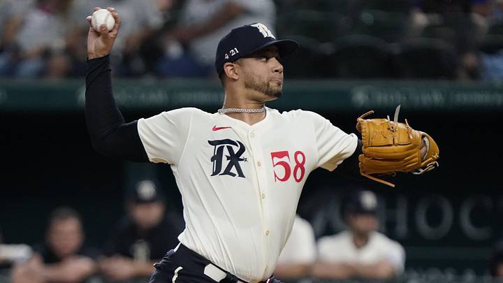 Sep 6, 2024; Arlington, Texas, USA; Texas Rangers pitcher Gerson Garabito (58) throws to the plate during the first inning against the Los Angeles Angels at Globe Life Field. Mandatory Credit: Raymond Carlin III-Imagn Images