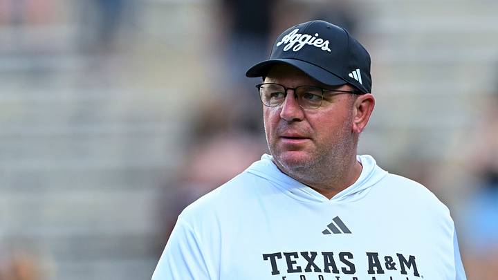 Texas A&M Aggies head coach Mike Elko looks on prior to the game against the Mississippi State Bulldogs at Kyle Field. Texas A&M Aggies head coach Mike Elko looks on prior to the game against the Mississippi State Bulldogs at Kyle Field.
