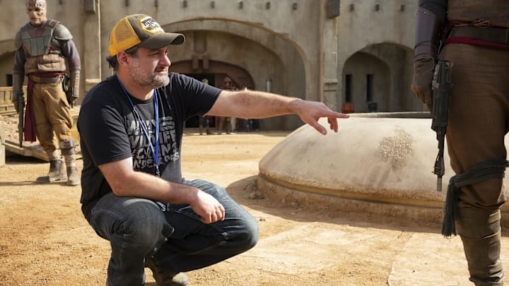 Disney Gallery: The Mandalorian Episode 1 "Directing" - Dave Filoni on the set of THE MANDALORIAN. Image Courtesy Disney+