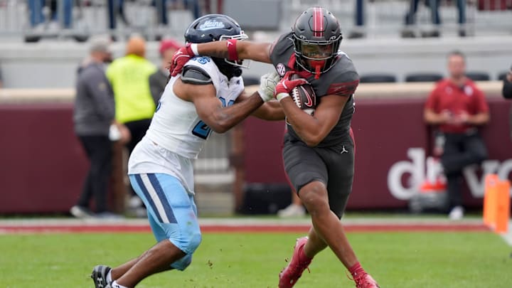 Oklahoma Sooners running back Xavier Robinson (21) fights off Maine Black Bears linebacker Jeremaine Baker (26) during a college football game between the University of Oklahoma Sooners (OU) and the Maine Black Bears at Gaylord Family - Oklahoma Memorial Stadium in Norman, Okla., Saturday, Nov. 2, 2024. Oklahoma Sooners running back Xavier Robinson (21) fights off Maine Black Bears linebacker Jeremaine Baker (26) during a college football game between the University of Oklahoma Sooners (OU) and the Maine Black Bears at Gaylord Family - Oklahoma Memorial Stadium in Norman, Okla., Saturday, Nov. 2, 2024.