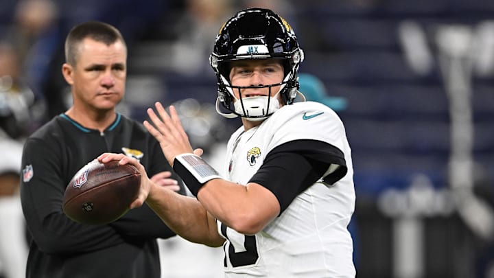Jan 5, 2025; Indianapolis, Indiana, USA; Jacksonville Jaguars quarterback Mac Jones (10) throws a pass to warm up before the game against the Indianapolis Colts at Lucas Oil Stadium. Mandatory Credit: Marc Lebryk-Imagn Images