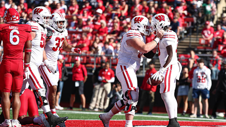 Wisconsin running back Darrion Dupree celebrates his touchdown run with offensive lineman Jake Renfro during the second half against Rutgers at SHI Stadium in Piscataway, N.J., on Oct, 12, 2024.