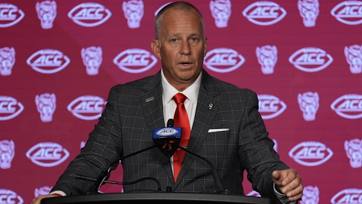 Jul 25, 2024; Charlotte, NC, USA; North Carolina State Wolfpack head coach Dave Doeren speaks to the media during the ACC Kickoff at Hilton Charlotte Uptown. Mandatory Credit: Jim Dedmon-Imagn Images Jul 25, 2024; Charlotte, NC, USA; North Carolina State Wolfpack head coach Dave Doeren speaks to the media during the ACC Kickoff at Hilton Charlotte Uptown. Mandatory Credit: Jim Dedmon-Imagn Images