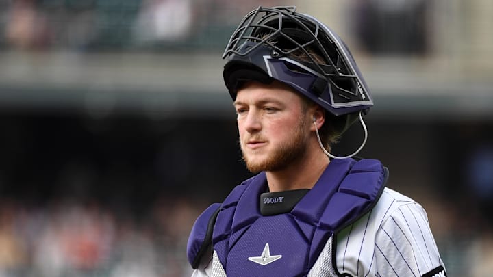 Colorado Rockies catcher Hunter Goodman (15) during the first inning against the San Diego Padres at Coors Field. Colorado Rockies catcher Hunter Goodman (15) during the first inning against the San Diego Padres at Coors Field.