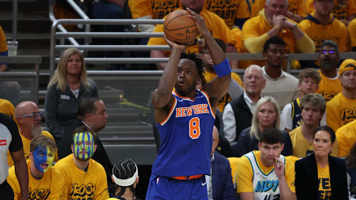 New York Knicks forward OG Anunoby (8) shoots a three point basket over Indiana Pacers guard Andrew Nembhard (2) during the first quarter of game three of the eastern conference finals for the 2025 NBA Playoffs at Gainbridge Fieldhouse.