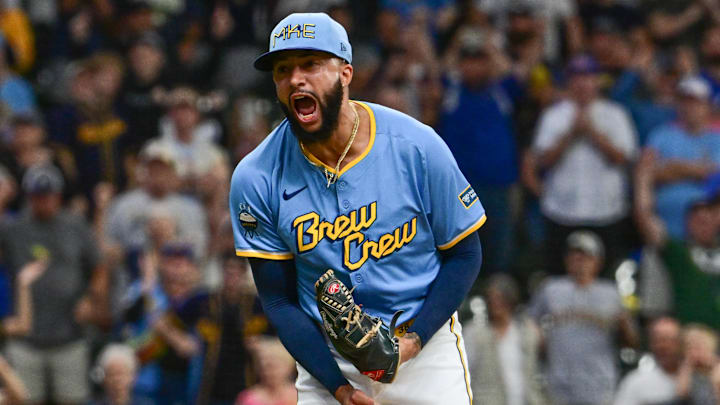 Sep 22, 2024; Milwaukee, Wisconsin, USA; Milwaukee Brewers pitcher Devin Williams (38) reacts after picking up a save in the ninth inning against the Arizona Diamondbacks at American Family Field.