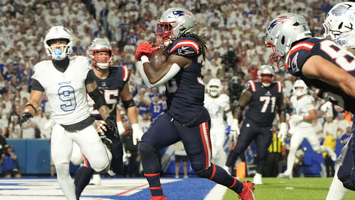 Oct 5, 2025; Orchard Park, New York, USA; New England Patriots running back Rhamondre Stevenson (38) rushes for a touchdown against the Buffalo Bills during the second half at Highmark Stadium. Mandatory Credit: Gregory Fisher-Imagn Images