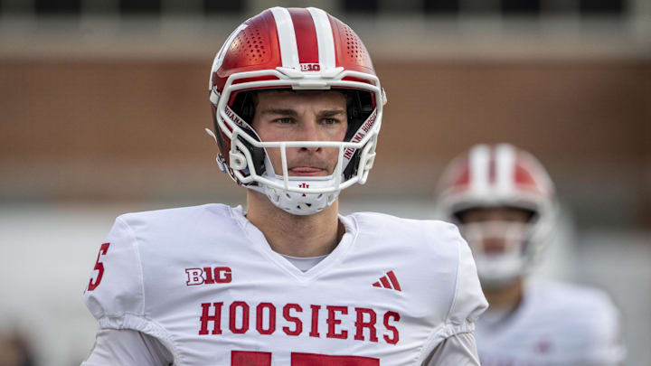 Nov 1, 2025; College Park, Maryland, USA;  Indiana Hoosiers quarterback Fernando Mendoza (15) warms up on the field before the game against the Maryland Terrapins at SECU Stadium. Mandatory Credit: Tommy Gilligan-Imagn Images