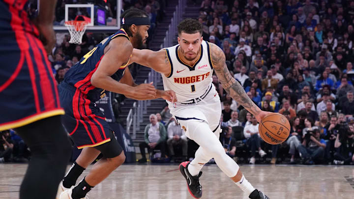 Apr 4, 2025; San Francisco, California, USA; Denver Nuggets forward Michael Porter Jr. (1) drives against Golden State Warriors guard Moses Moody (4) in the second period at Chase Center. Mandatory Credit: David Gonzales-Imagn Images Apr 4, 2025; San Francisco, California, USA; Denver Nuggets forward Michael Porter Jr. (1) drives against Golden State Warriors guard Moses Moody (4) in the second period at Chase Center. Mandatory Credit: David Gonzales-Imagn Images