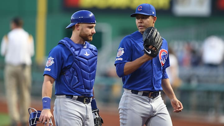 Chicago Cubs catcher Jonathan Lucroy (25) and starting pitcher Jose Quintana.