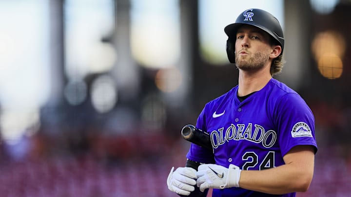 Jul 10, 2024; Cincinnati, Ohio, USA; Colorado Rockies third baseman Ryan McMahon (24) reacts after striking out in the first inning against the Cincinnati Reds at Great American Ball Park. Jul 10, 2024; Cincinnati, Ohio, USA; Colorado Rockies third baseman Ryan McMahon (24) reacts after striking out in the first inning against the Cincinnati Reds at Great American Ball Park.