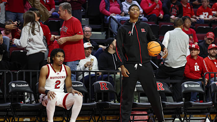 Nov 11, 2024; Piscataway, New Jersey, USA; Rutgers Scarlet Knights guard Dylan Harper (2) and guard Ace Bailey (4) looks on during halftime against the St. Peter's Peacocks at Jersey Mike's Arena. Mandatory Credit: Vincent Carchietta-Imagn Images