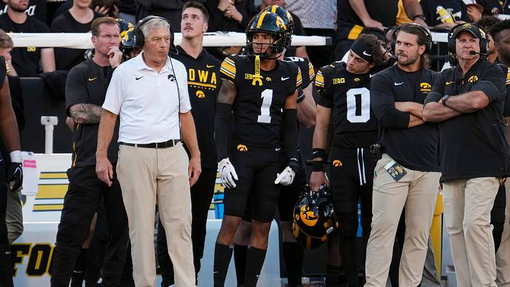 Iowa Hawkeyes head coach Kirk Ferentz, left, watches during the NCAA football game against the Ohio State Buckeyes at Kinnick Stadium in Iowa City on Oct. 3, 2026.