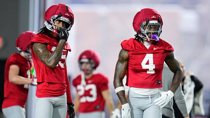 Ohio State Buckeyes wide receiver Chris Henry Jr. (15) stands beside Jeremiah Smith (4) during the first day of spring workouts for the 2026 football season at Woody Hayes Athletic Complex in Columbus on March 10, 2026. Ohio State Buckeyes wide receiver Chris Henry Jr. (15) stands beside Jeremiah Smith (4) during the first day of spring workouts for the 2026 football season at Woody Hayes Athletic Complex in Columbus on March 10, 2026.