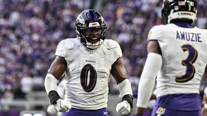 Nov 9, 2025; Minneapolis, Minnesota, USA; Baltimore Ravens linebacker Roquan Smith (0) reacts with cornerback Chidobe Awuzie (3) during the third quarter against the Minnesota Vikings at U.S. Bank Stadium. Mandatory Credit: Jeffrey Becker-Imagn Images