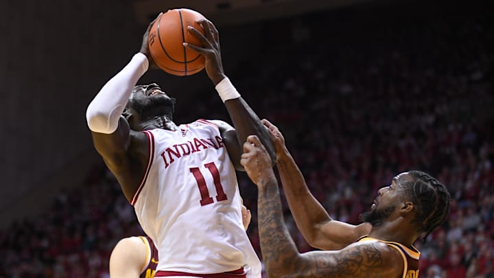Indiana Hoosiers center Oumar Ballo (11) is fouled by Minnesota Golden Gophers guard Femi Odukale (11) during the first half at Simon Skjodt Assembly Hall.