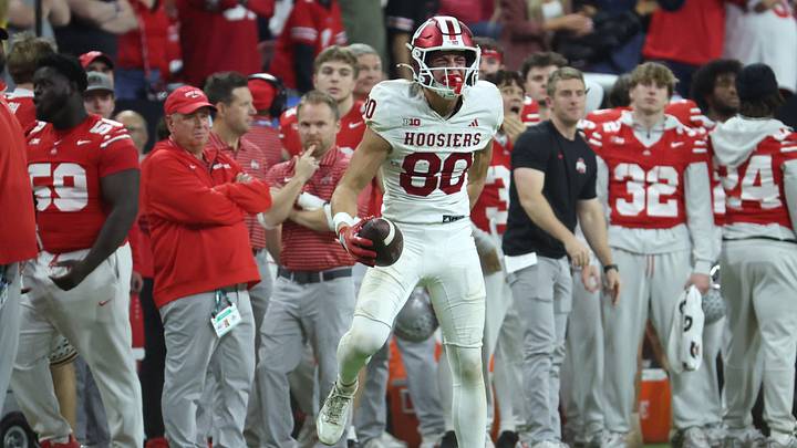 Dec 6, 2025; Indianapolis, IN, USA; Indiana Hoosiers wide receiver Charlie Becker (80) celebrates after a catch against the Ohio State Buckeyes in the fourth quarter during the 2025 Big Ten championship game at Lucas Oil Stadium. Mandatory Credit: Trevor Ruszkowski-Imagn Images