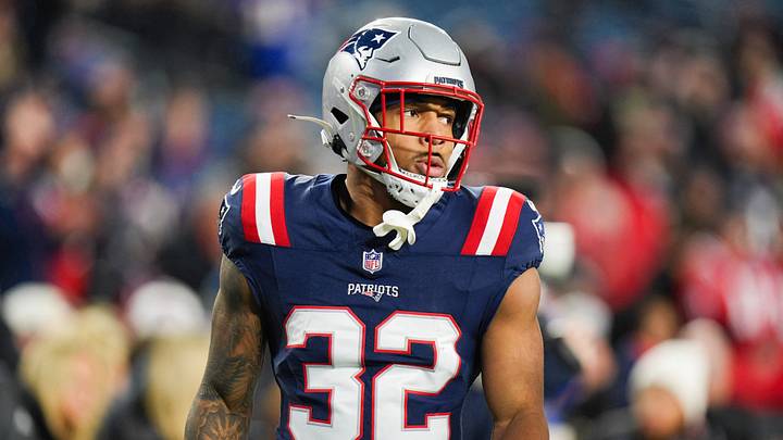 Jan 11, 2026; Foxborough, MA, USA; New England Patriots running back Treveyon Henderson (32) looks on before the game against the Los Angeles Chargers in an AFC Wild Card Round game at Gillette Stadium. Mandatory Credit: David Butler II-Imagn Images Jan 11, 2026; Foxborough, MA, USA; New England Patriots running back Treveyon Henderson (32) looks on before the game against the Los Angeles Chargers in an AFC Wild Card Round game at Gillette Stadium. Mandatory Credit: David Butler II-Imagn Images