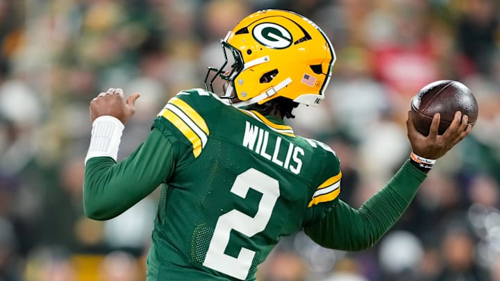 Dec 27, 2025; Green Bay, Wisconsin, USA; Green Bay Packers quarterback Malik Willis (2) throws a pass during the first quarter against the Baltimore Ravens at Lambeau Field. 