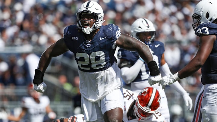 Penn State football defensive tackle Zane Durant reacts following a tackle