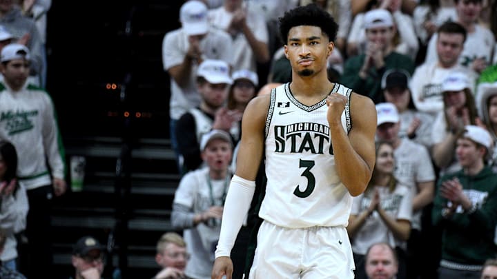 Feb 8, 2025; East Lansing, Michigan, USA;  Michigan State Spartans guard Jaden Akins (3) pumps his fist after forcing a Oregon Ducks turnover during the second half at Jack Breslin Student Events Center. Mandatory Credit: Dale Young-Imagn Images