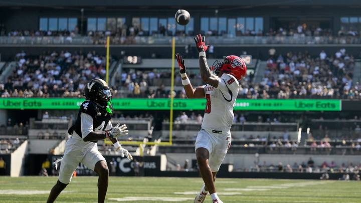 Sep 19, 2026; Nashville, Tennessee, USA; NC State Wolfpack wide receiver Keenan Jackson (8) makes a catch in the end zone past Vanderbilt Commodores cornerback Martel Hight (4) during the second half at FirstBank Stadium. Mandatory Credit: Steve Roberts-Imagn Images Sep 19, 2026; Nashville, Tennessee, USA; NC State Wolfpack wide receiver Keenan Jackson (8) makes a catch in the end zone past Vanderbilt Commodores cornerback Martel Hight (4) during the second half at FirstBank Stadium. Mandatory Credit: Steve Roberts-Imagn Images