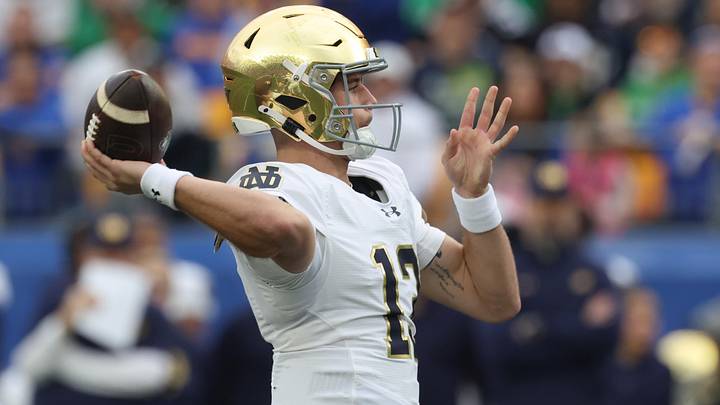 Nov 15, 2025; Pittsburgh, Pennsylvania, USA; Notre Dame Fighting Irish quarterback CJ Carr (13) passes against the Pittsburgh Panthers during the first quarter at Acrisure Stadium. Mandatory Credit: Charles LeClaire-Imagn Images Nov 15, 2025; Pittsburgh, Pennsylvania, USA; Notre Dame Fighting Irish quarterback CJ Carr (13) passes against the Pittsburgh Panthers during the first quarter at Acrisure Stadium. Mandatory Credit: Charles LeClaire-Imagn Images