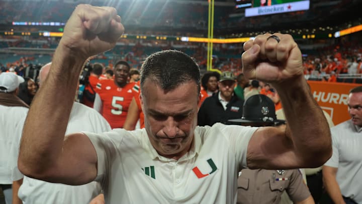 Aug 31, 2025; Miami Gardens, Florida, USA; Miami Hurricanes head coach Mario Cristobal reacts after defeating the Notre Dame Fighting Irish at Hard Rock Stadium. Mandatory Credit: Sam Navarro-Imagn Images